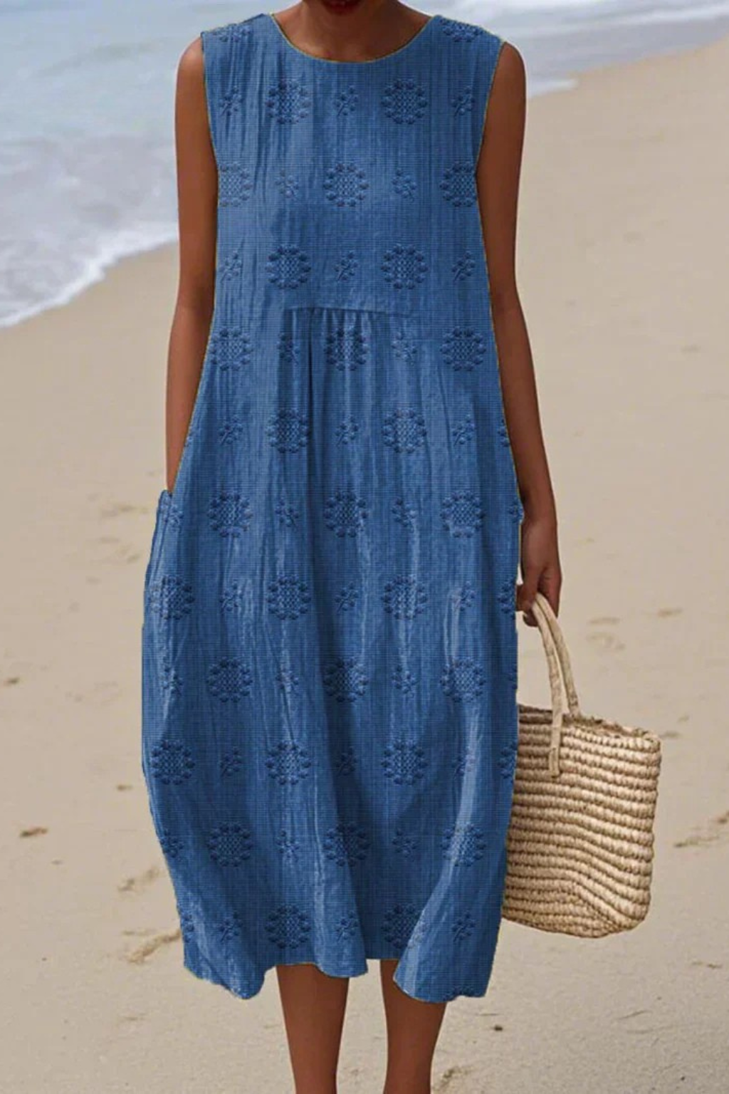 Blue embroidery midi dress with textured diamond pattern and flowing tiered hem