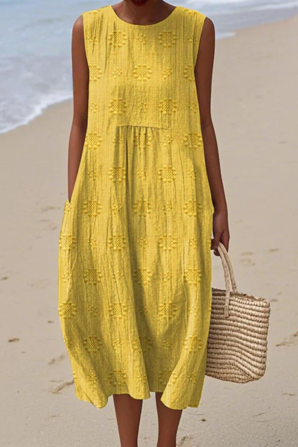 Yellow embroidery midi dress with textured geometric pattern and tiered design