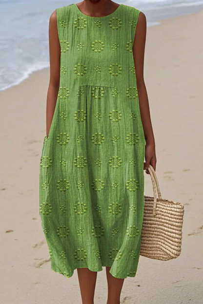 Lime green embroidery midi dress with geometric diamond pattern and tiered skirt