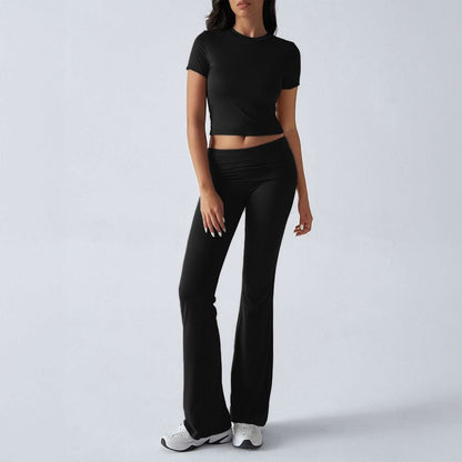 Black short-sleeve crop top with ruched high-waist flare pants