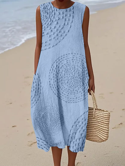 Light blue textured maxi dress with round neckline and relaxed silhouette