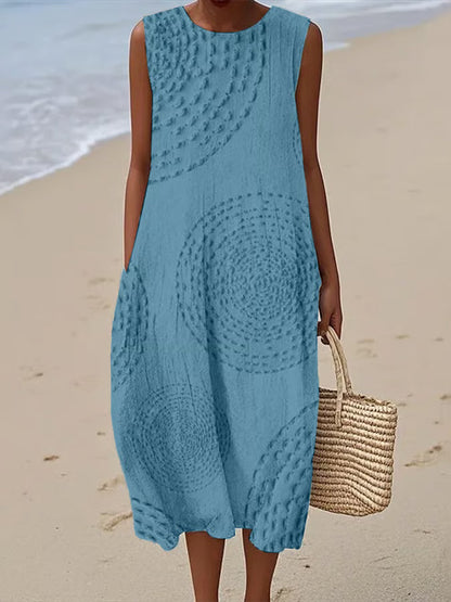 Teal textured maxi dress with circular pattern and functional side pockets