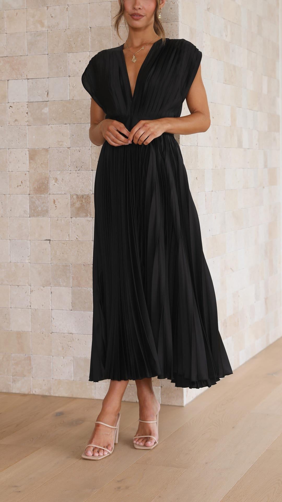 Black pleated midi dress with deep V-neck and cap sleeves