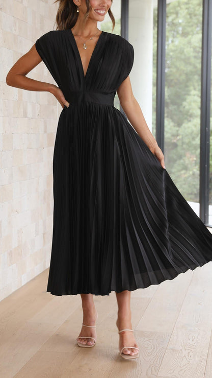 Black pleated midi dress front view with V-neckline detail