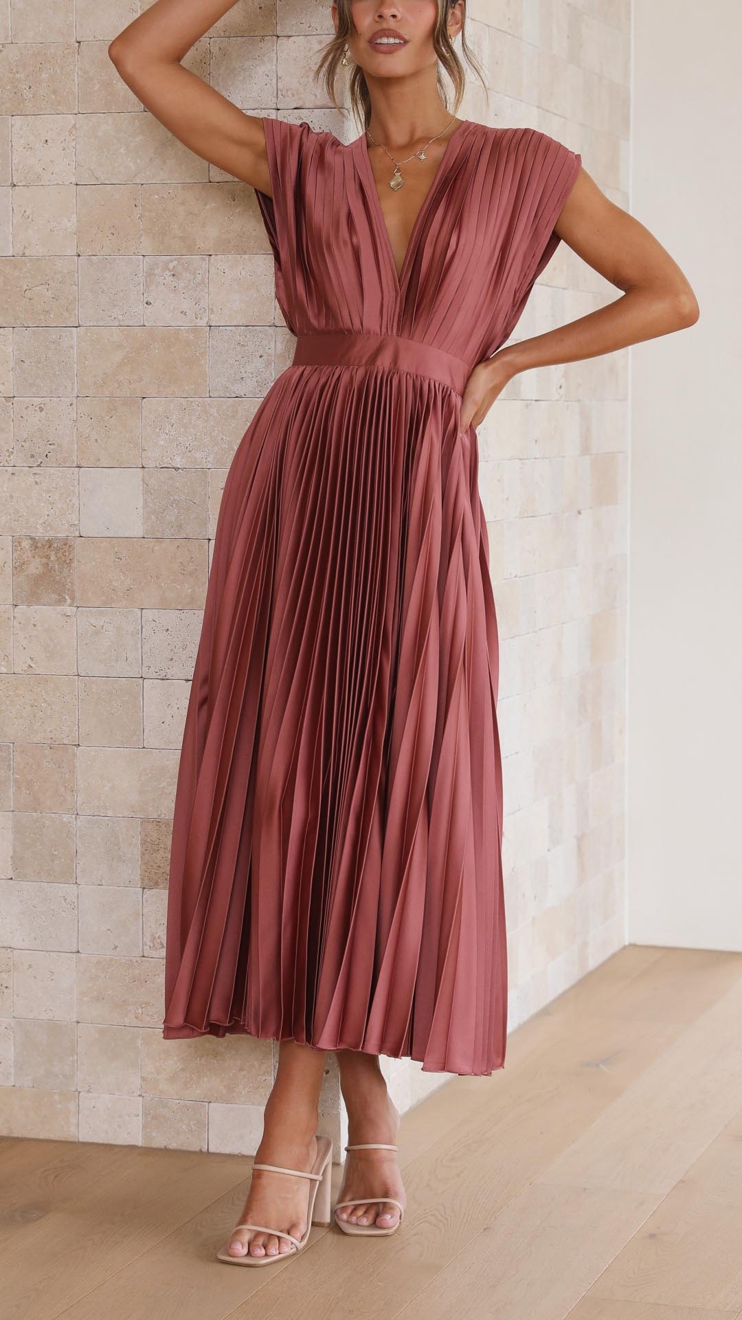 Mauve pleated midi dress with cap sleeves and flowing skirt