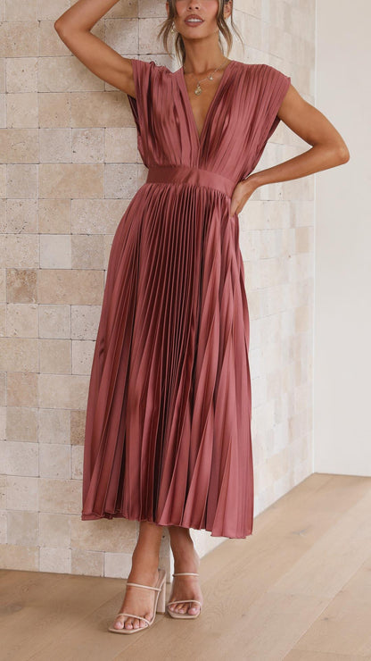 Mauve pleated midi dress with cap sleeves and flowing skirt