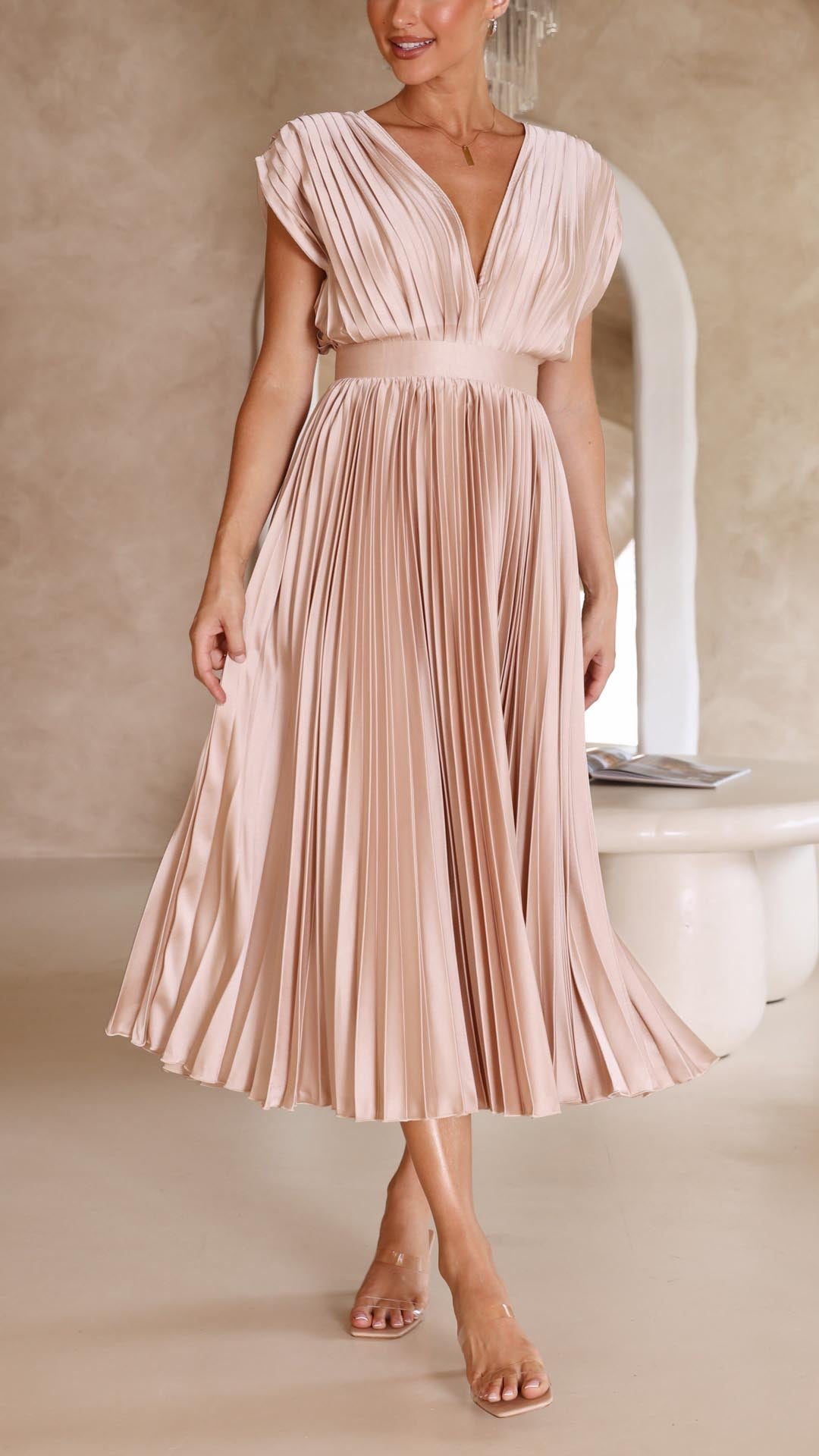 Blush pink pleated midi dress full-length view with cinched waist