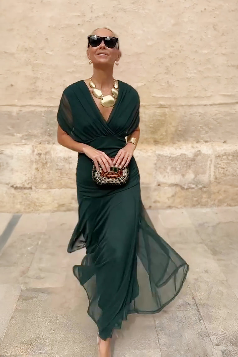 Forest green wrap maxi dress with flowing draped skirt detail