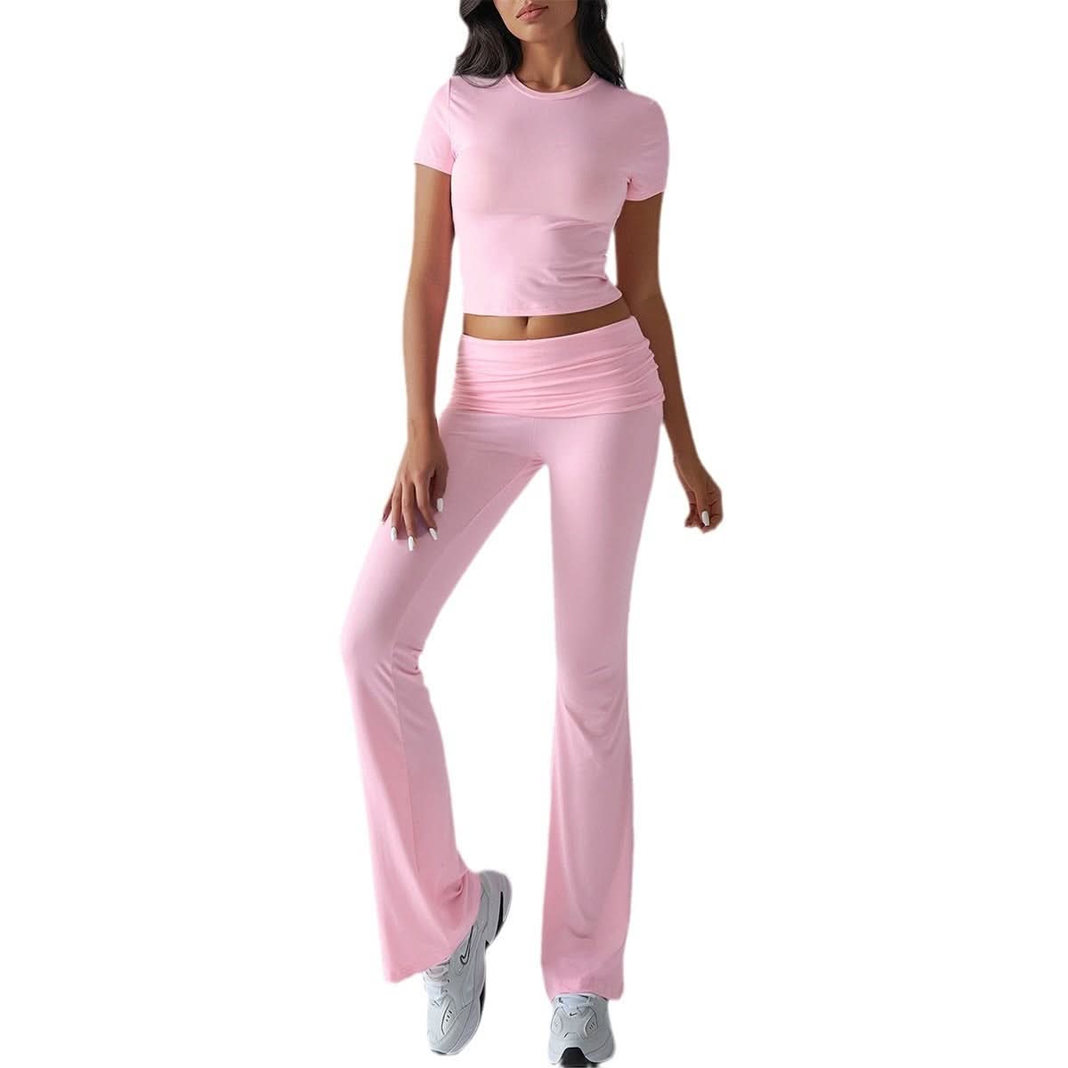 Pink ruched lounge set featuring fitted crop tee and flare pants with waist gathering