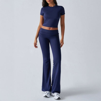 Navy ruched lounge set with fitted crop top and high-waist flare pants