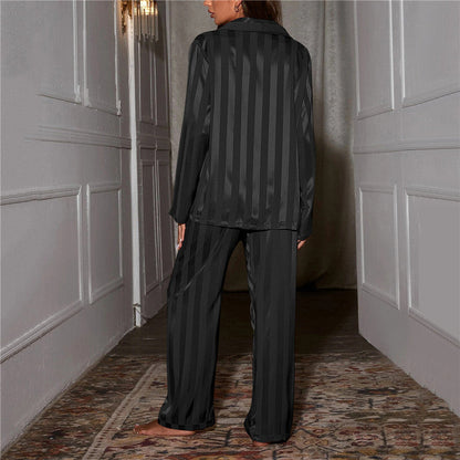 Back view of charcoal striped satin pajama shirt showing vertical stripe pattern