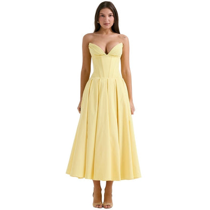 Pale yellow strapless corset midi dress with sweetheart neckline and full skirt