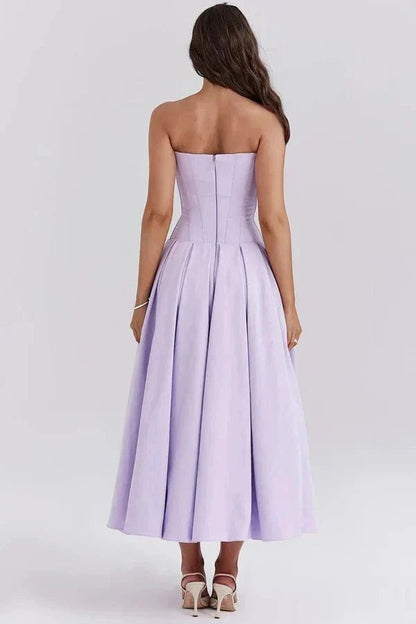Back view of lavender strapless corset dress with structured bodice and full skirt