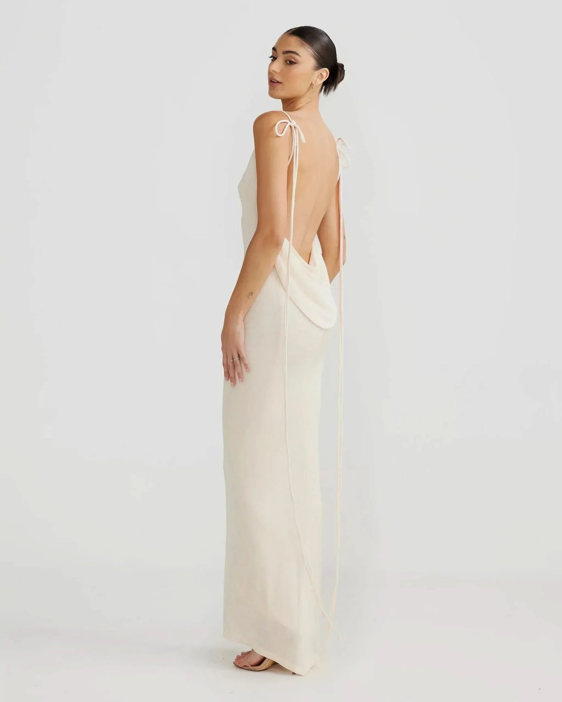 Cream backless cowl maxi dress with floor-length hem and draped back for women