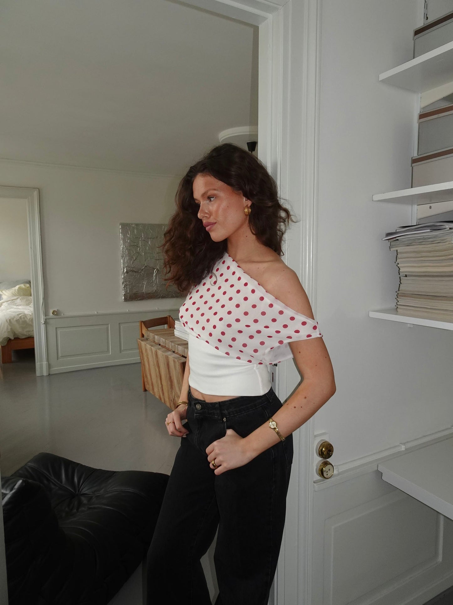 White and red polka dot crop top with draped shoulder design