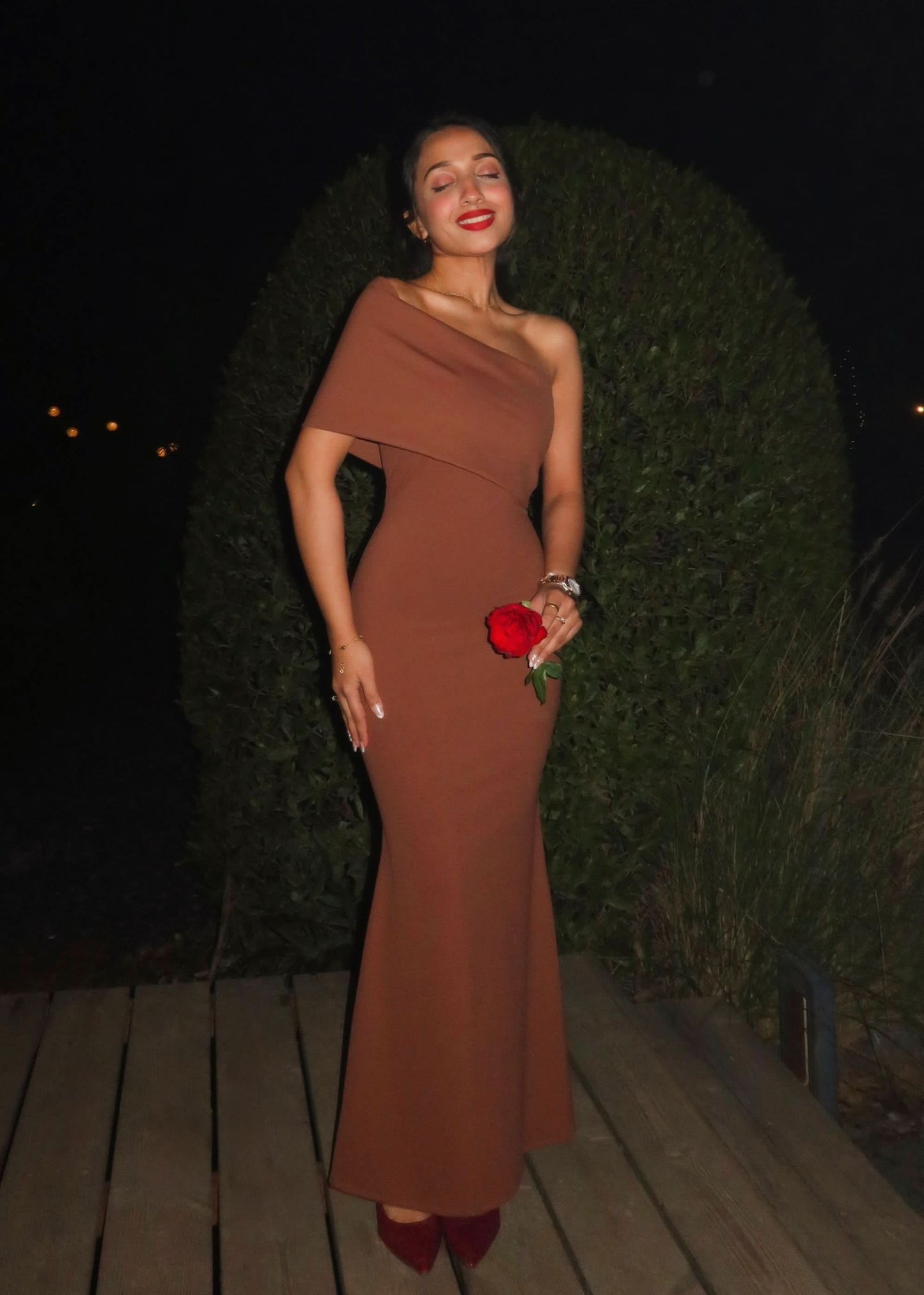 Terracotta fold-over maxi dress with off-shoulder design and flowing skirt