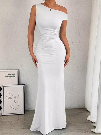 Front view of navy ruched maxi dress with off-shoulder design and cinched waist