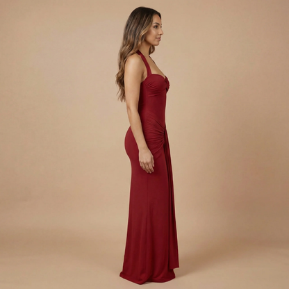 Deep burgundy ruched maxi dress side profile showing gathered waist detail
