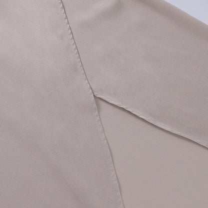 Cream wrap dress wrap closure detail at waist seam