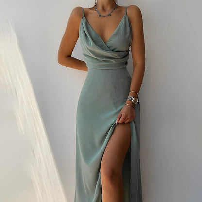 Sage green wrap maxi dress with draped bodice and leg slit