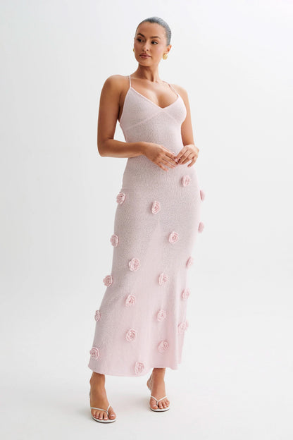 Full-length pink floral maxi dress with textured rose details