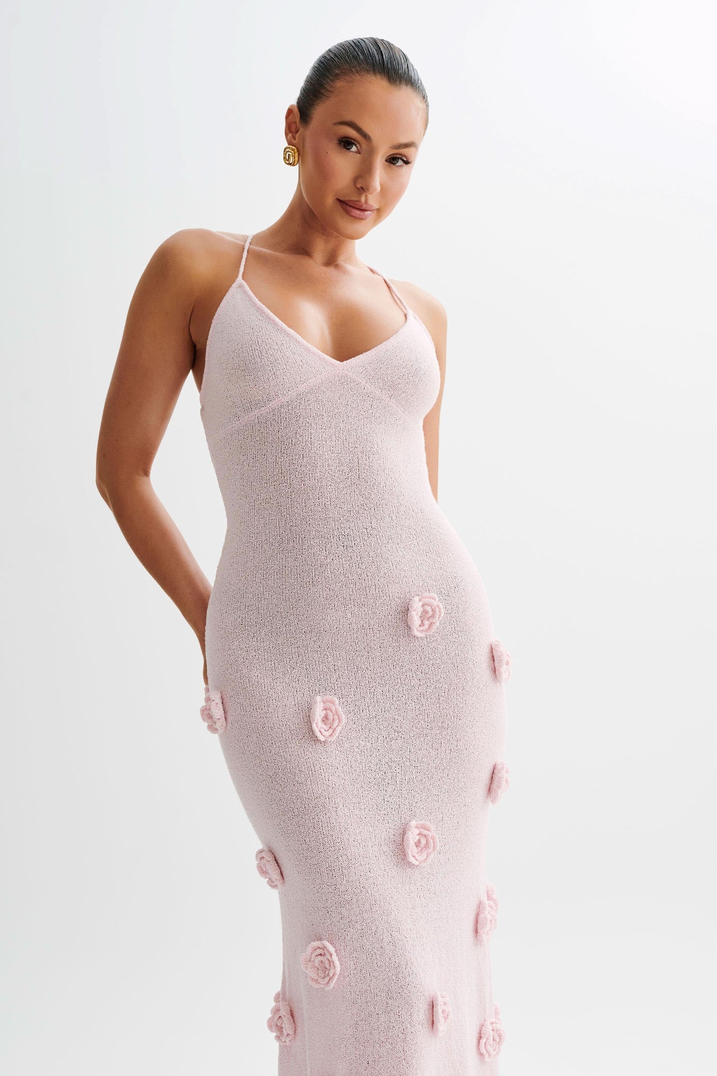 Pink knit maxi dress with dimensional floral rose embellishments