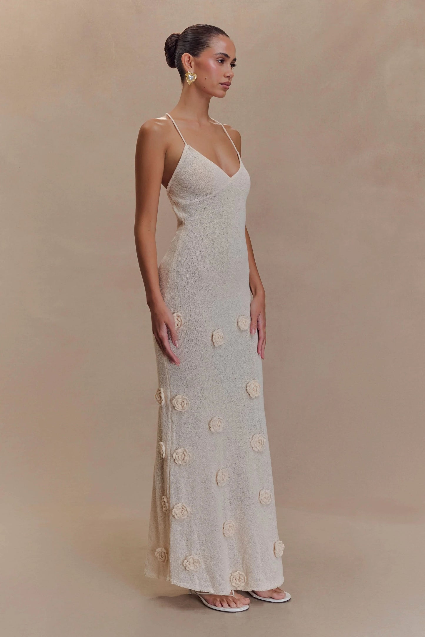 Cream ribbed maxi dress with cream rose details, side profile