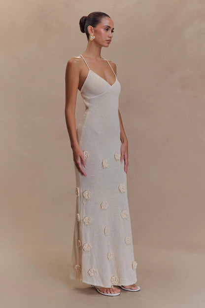Cream ribbed maxi dress with cream rose details, side profile