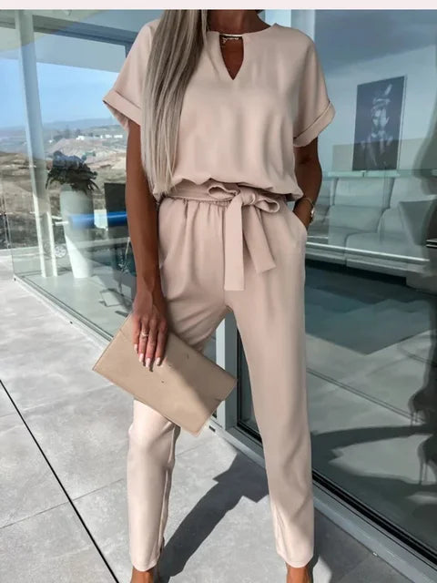 Beige keyhole wrap jumpsuit with rolled sleeves and tie waist detail