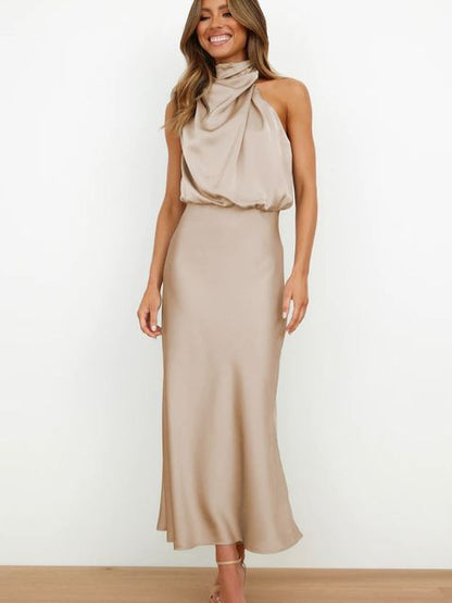 Cream halter draped midi dress with twisted neckline and sleek silhouette