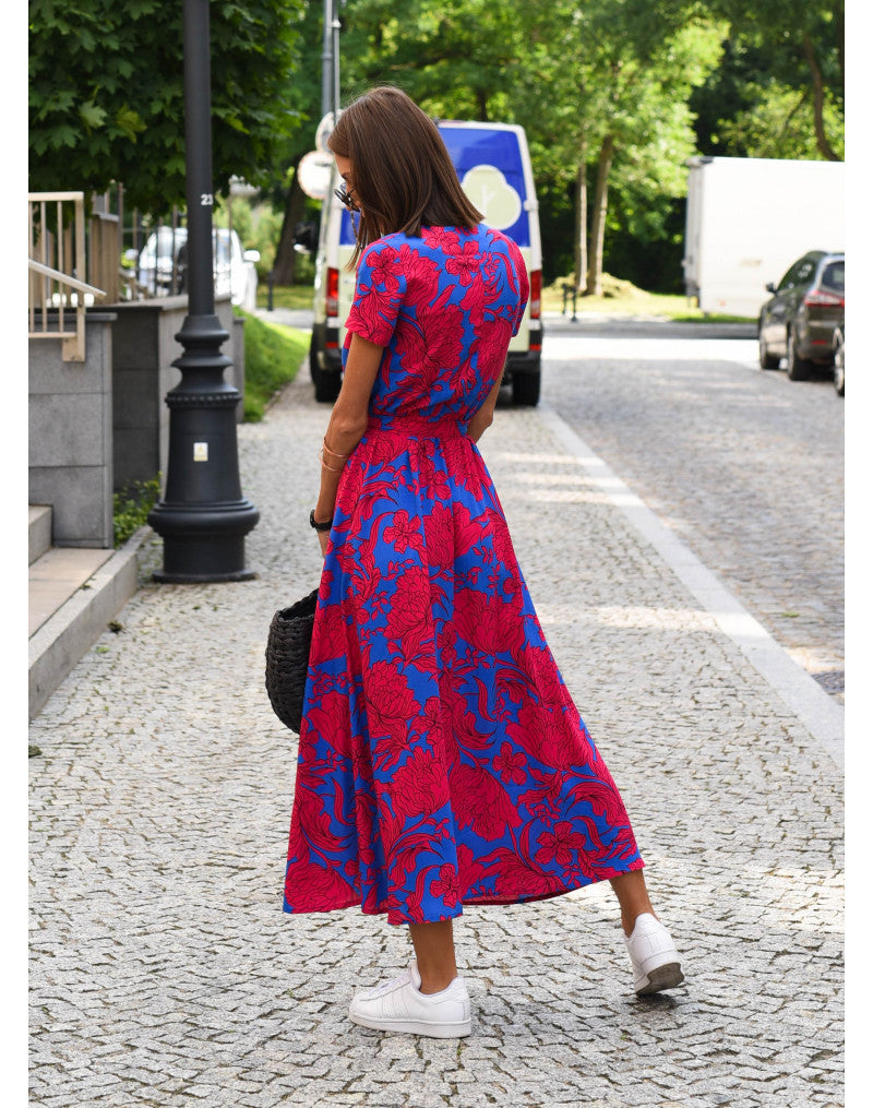Red and blue floral wrap midi dress back view showing drape and slit