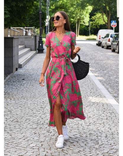 Pink and green floral wrap midi dress with short sleeves and side slit