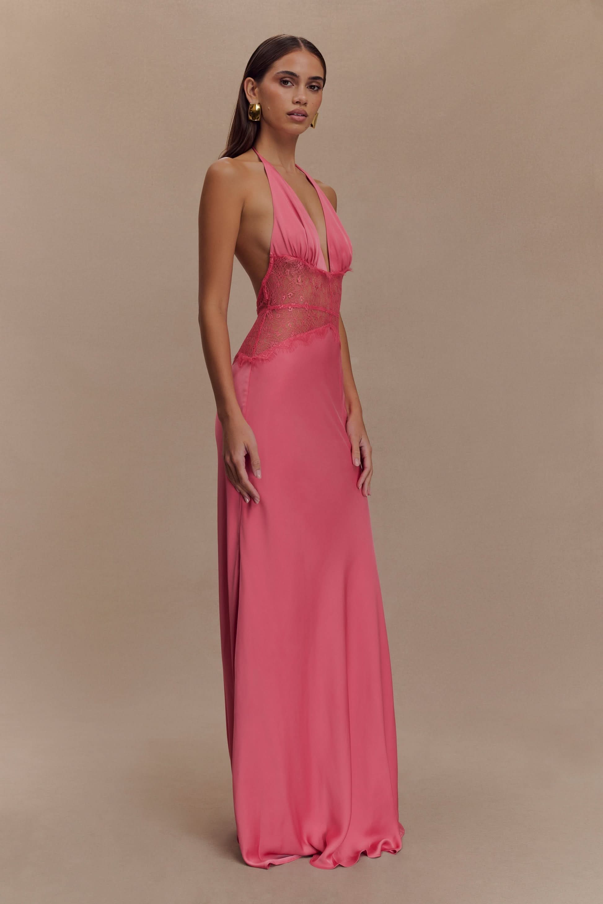 pink halter maxi dress with ornate lace waist and deep V-neckline