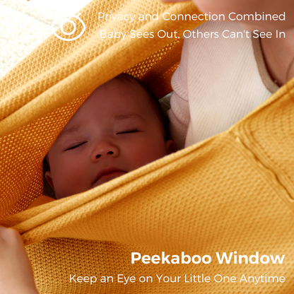 Sleeping infant visible through peekaboo window in golden nursing poncho