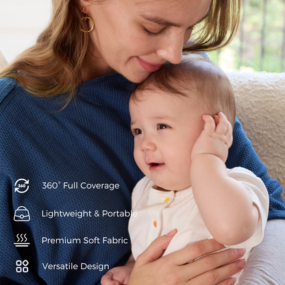 Navy nursing poncho worn while holding baby showing full coverage