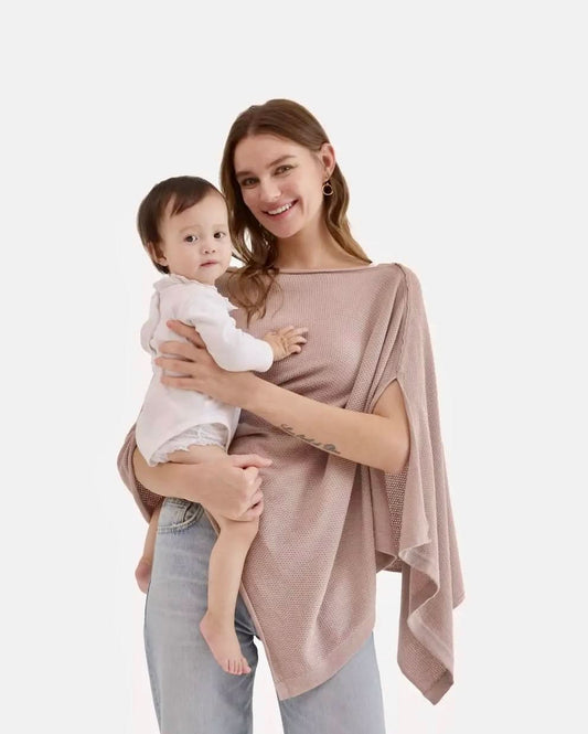 Taupe nursing poncho worn while holding infant, showing draped front coverage