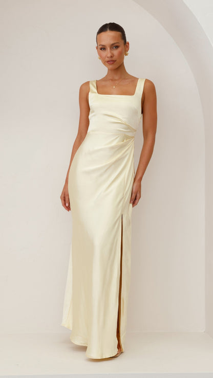 Cream sleeveless ruched maxi dress with square neckline and side slit