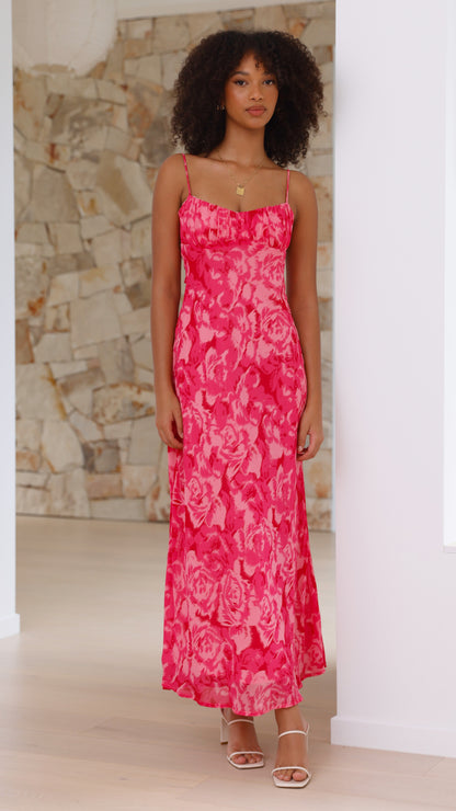 Front full-length view of pink floral midi dress with fitted bodice