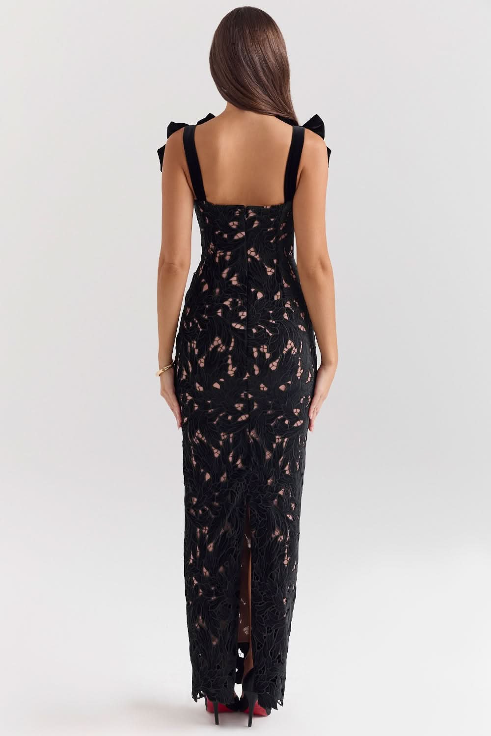 Black lace maxi dress rear view with bow straps and high slit detail