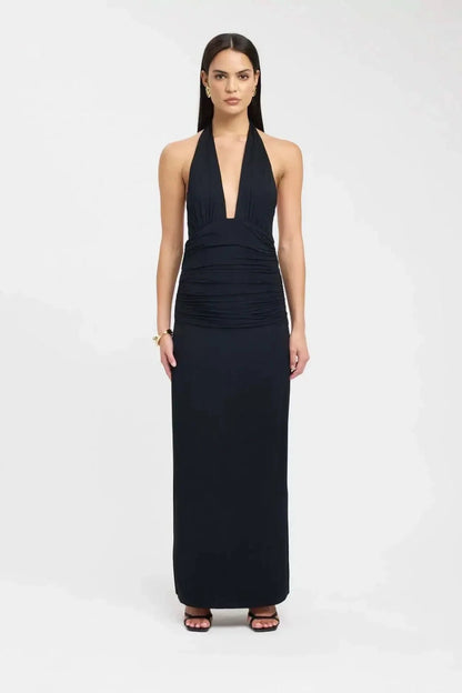 Side view of black maxi dress showing cutout ruched waist detail