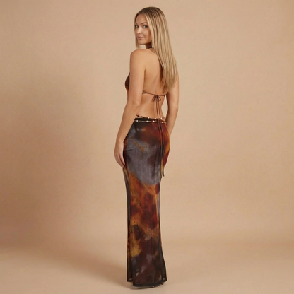 Open-back halter maxi dress in leopard print with adjustable tie closure